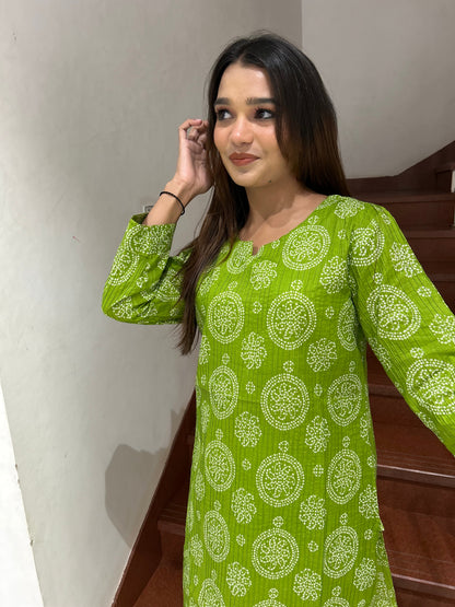 Model wearing green bandhani print cotton kurti full length
